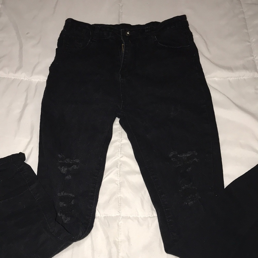 black ripped jeans